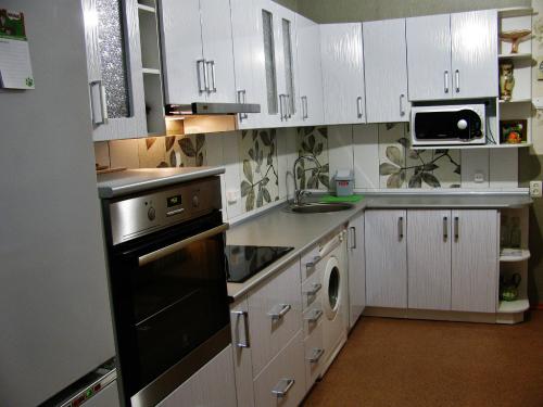 Какой фартук лучше сделать на кухне. Как выбрать фартук для кухни: практические советы, фото примеры 09