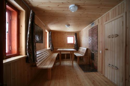 Проекты бани с комнатой отдыха и террасой. Баня с террасой на свайном фундаменте 19