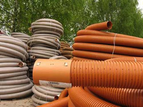 Как правильно укладывать дренажную трубу в геотекстиле на участке. Особенности укладки дренажных труб с геотекстилем 01