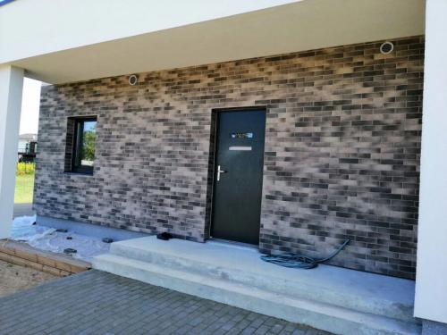 Облицовочная плитка для фасада дома. Фасадная плитка: виды, характеристики, особенности монтажа, новинки дизайна, инструкция + 150 фото