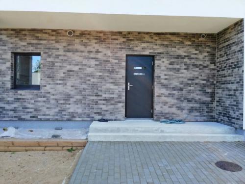 Облицовочная плитка для фасада дома. Фасадная плитка: виды, характеристики, особенности монтажа, новинки дизайна, инструкция + 150 фото